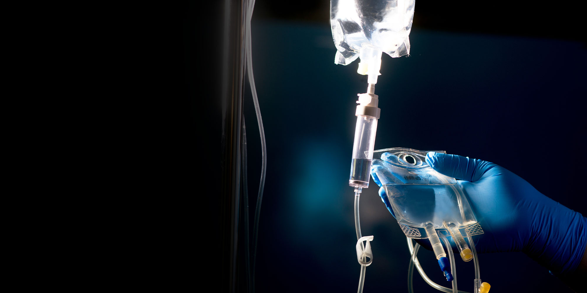 IV drip bag being prepared for sedation