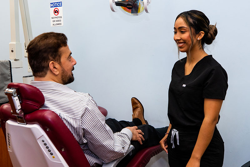 dental assistant talking about clear aligners