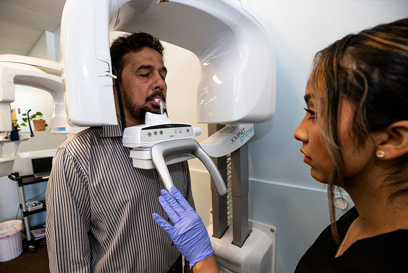 dental implant patient receiving CBCT scan